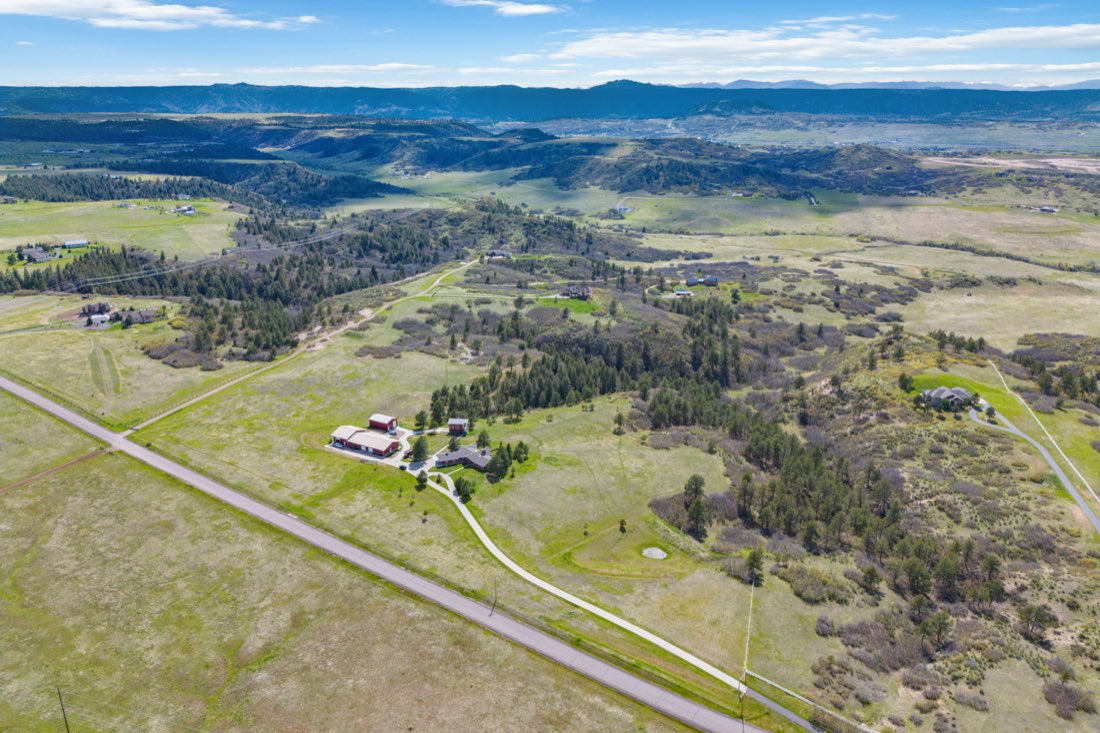 The property framed by Colorado foothills