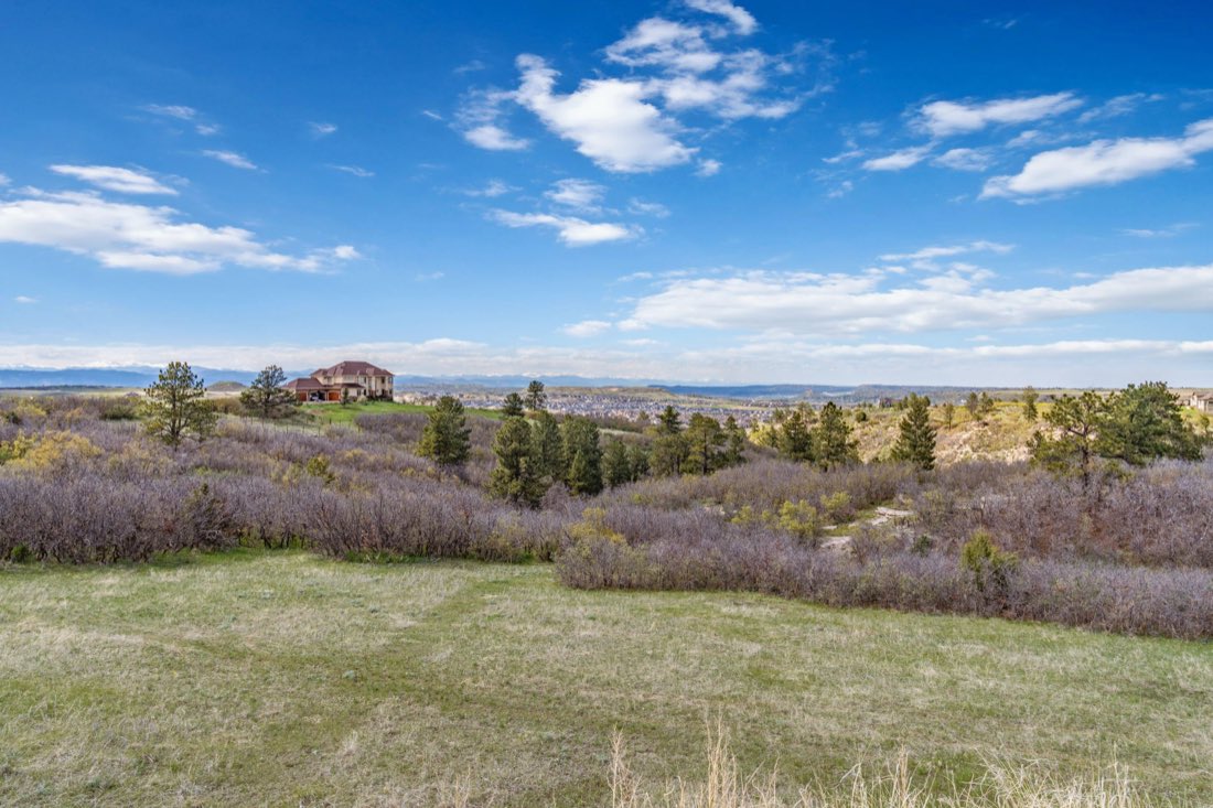 The ranch sitting above the valley